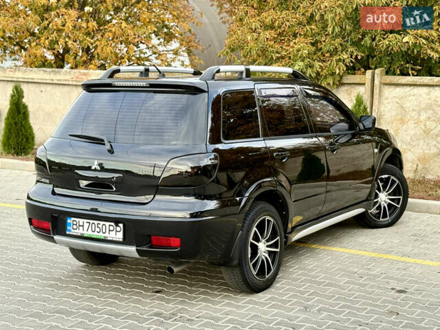 Міцубісі Аутлендер 2007 у Одесі на Automoto.ua Чорний Міцубісі Аутлендер, об'ємом двигуна 2.4 л та пробігом 201 тис. км за 7700 $, фото 8 на Automoto.ua