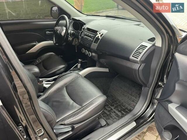 Черный Мицубиси Аутлендер, объемом двигателя 3 л и пробегом 200 тыс. км за 7999 $, фото 24 на Automoto.ua