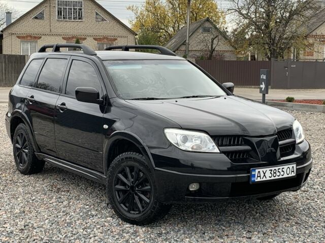 Міцубісі Аутлендер 2007 у Харкові на Automoto.ua Чорний Міцубісі Аутлендер, об'ємом двигуна 2.4 л та пробігом 240 тис. км за 5600 $, фото 9 на Automoto.ua