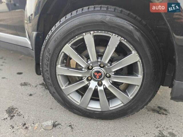 Черный Мицубиси Аутлендер, объемом двигателя 3 л и пробегом 155 тыс. км за 9800 $, фото 24 на Automoto.ua