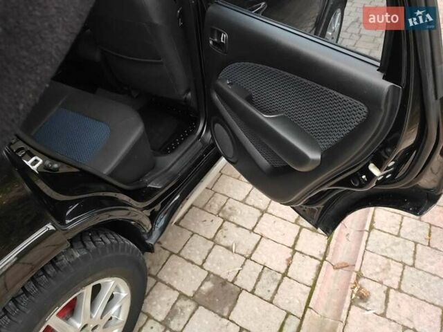 Черный Мицубиси Аутлендер, объемом двигателя 2 л и пробегом 180 тыс. км за 6000 $, фото 13 на Automoto.ua