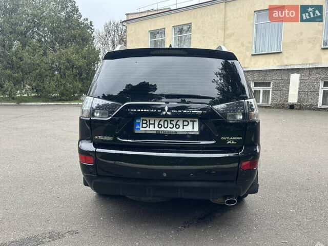 Чорний Міцубісі Аутлендер, об'ємом двигуна 2.4 л та пробігом 230 тис. км за 8300 $, фото 8 на Automoto.ua