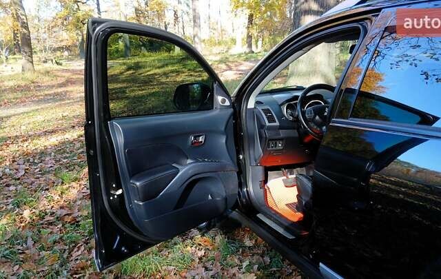 Міцубісі Аутлендер 2007 у Белой Церкве на Automoto.ua Чорний Міцубісі Аутлендер, об'ємом двигуна 3 л та пробігом 230 тис. км за 8800 $, фото 7 на Automoto.ua