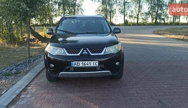 Черный Мицубиси Аутлендер, объемом двигателя 1.97 л и пробегом 244 тыс. км за 9000 $, фото 8 на Automoto.ua