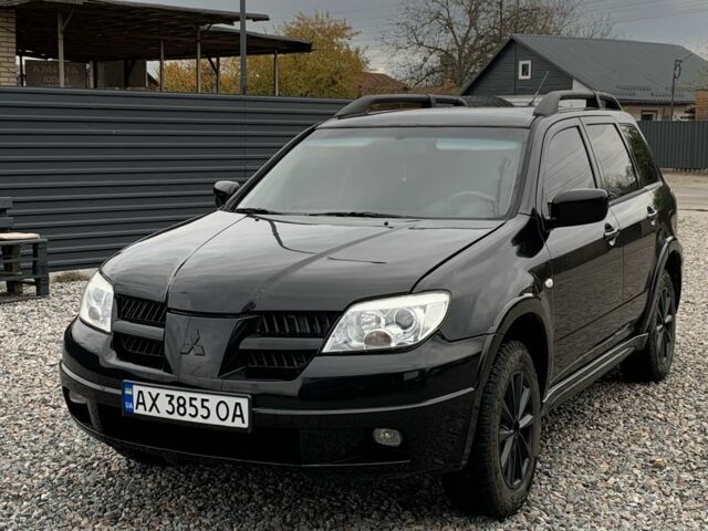 Міцубісі Аутлендер 2007 у Харкові на Automoto.ua Чорний Міцубісі Аутлендер, об'ємом двигуна 2.4 л та пробігом 240 тис. км за 5600 $, фото 5 на Automoto.ua