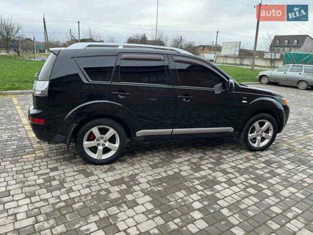 Черный Мицубиси Аутлендер, объемом двигателя 3 л и пробегом 200 тыс. км за 7999 $, фото 19 на Automoto.ua
