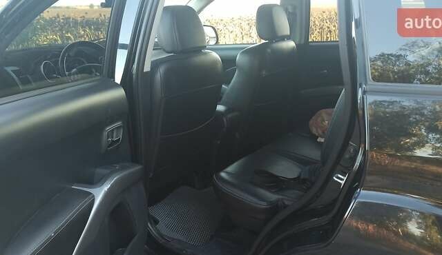 Черный Мицубиси Аутлендер, объемом двигателя 1.97 л и пробегом 244 тыс. км за 9000 $, фото 15 на Automoto.ua