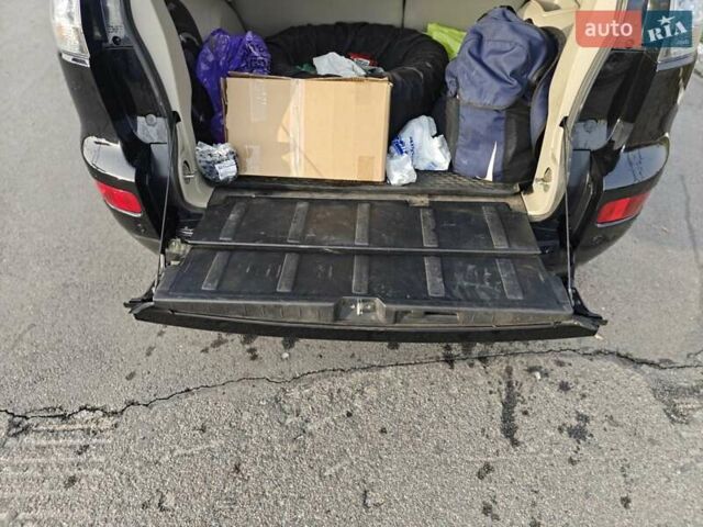 Черный Мицубиси Аутлендер, объемом двигателя 3 л и пробегом 155 тыс. км за 9800 $, фото 21 на Automoto.ua
