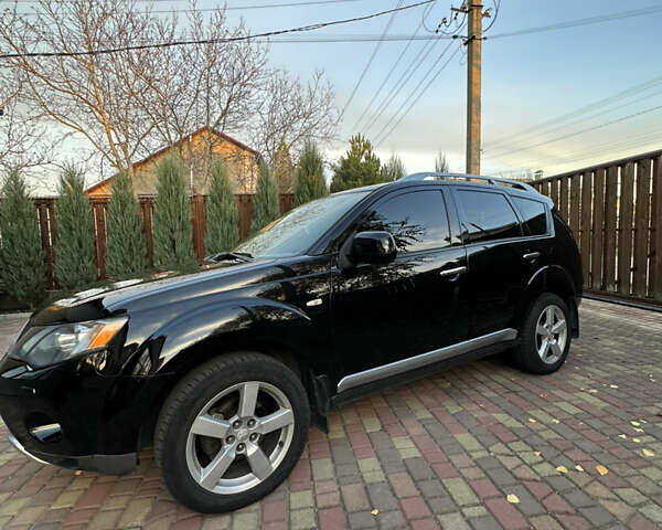 Чорний Міцубісі Аутлендер, об'ємом двигуна 3 л та пробігом 238 тис. км за 11200 $, фото 3 на Automoto.ua