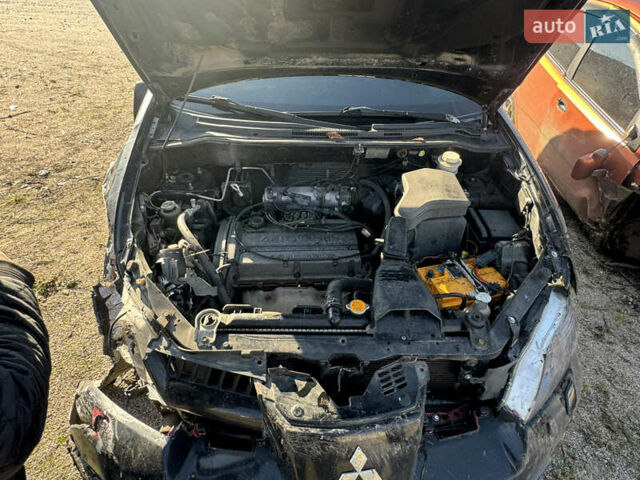 Черный Мицубиси Аутлендер, объемом двигателя 2 л и пробегом 258 тыс. км за 2200 $, фото 21 на Automoto.ua