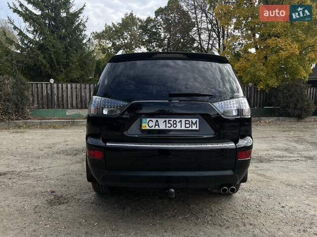 Чорний Міцубісі Аутлендер, об'ємом двигуна 3 л та пробігом 137 тис. км за 9800 $, фото 5 на Automoto.ua