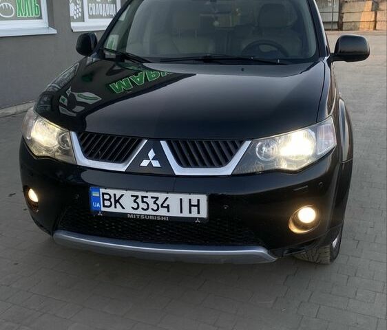 Чорний Міцубісі Аутлендер, об'ємом двигуна 2.4 л та пробігом 200 тис. км за 8300 $, фото 4 на Automoto.ua