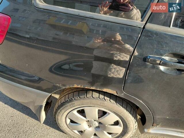 Чорний Міцубісі Аутлендер, об'ємом двигуна 2 л та пробігом 260 тис. км за 5500 $, фото 8 на Automoto.ua