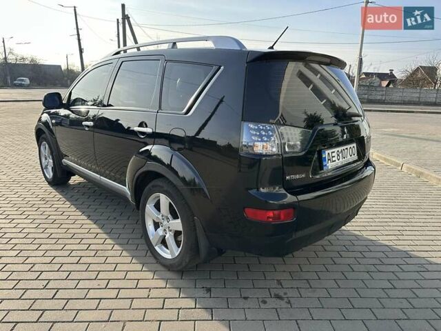 Черный Мицубиси Аутлендер, объемом двигателя 2.4 л и пробегом 234 тыс. км за 7400 $, фото 3 на Automoto.ua