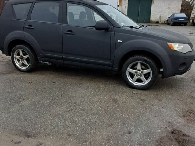 Чорний Міцубісі Аутлендер, об'ємом двигуна 2 л та пробігом 260 тис. км за 4500 $, фото 1 на Automoto.ua