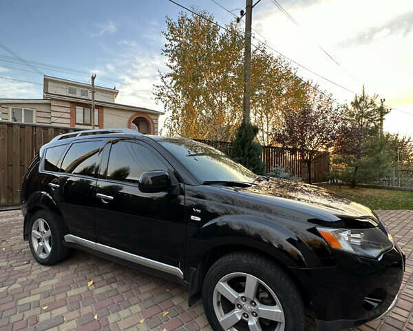 Чорний Міцубісі Аутлендер, об'ємом двигуна 3 л та пробігом 238 тис. км за 11200 $, фото 4 на Automoto.ua