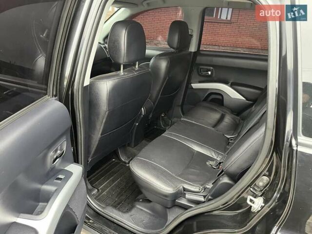 Черный Мицубиси Аутлендер, объемом двигателя 3 л и пробегом 200 тыс. км за 7999 $, фото 25 на Automoto.ua