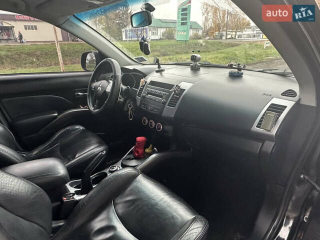 Чорний Міцубісі Аутлендер, об'ємом двигуна 3 л та пробігом 201 тис. км за 8700 $, фото 20 на Automoto.ua