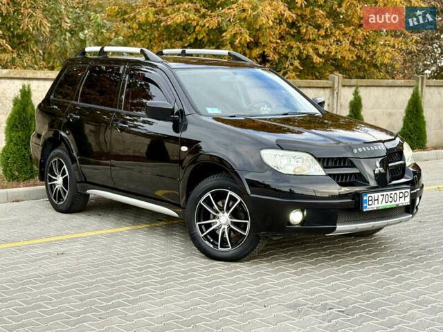 Міцубісі Аутлендер 2007 у Одесі на Automoto.ua Чорний Міцубісі Аутлендер, об'ємом двигуна 2.4 л та пробігом 201 тис. км за 7700 $, фото 1 на Automoto.ua