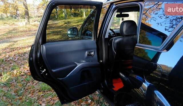 Міцубісі Аутлендер 2007 у Белой Церкве на Automoto.ua Чорний Міцубісі Аутлендер, об'ємом двигуна 3 л та пробігом 230 тис. км за 8800 $, фото 8 на Automoto.ua