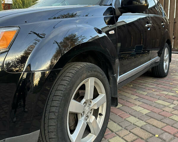 Чорний Міцубісі Аутлендер, об'ємом двигуна 3 л та пробігом 238 тис. км за 11200 $, фото 10 на Automoto.ua