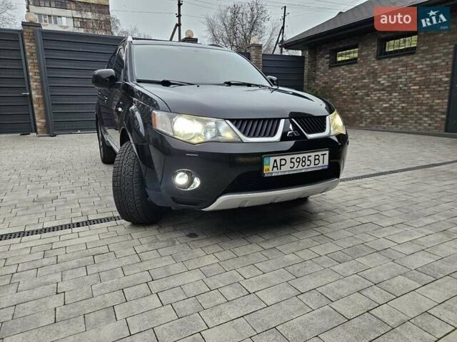 Черный Мицубиси Аутлендер, объемом двигателя 3 л и пробегом 238 тыс. км за 10800 $, фото 17 на Automoto.ua