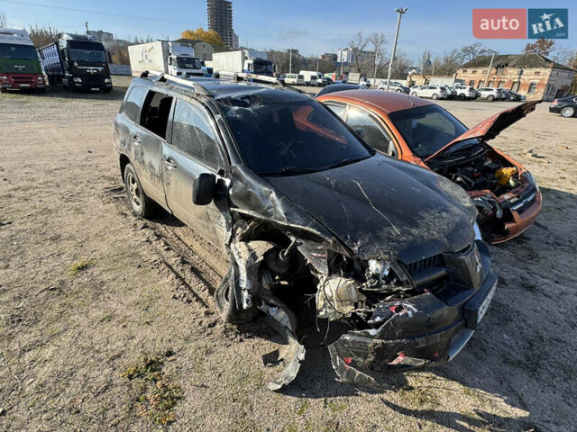 Черный Мицубиси Аутлендер, объемом двигателя 2 л и пробегом 258 тыс. км за 2200 $, фото 8 на Automoto.ua