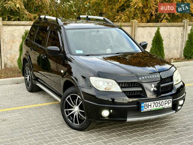 Міцубісі Аутлендер 2007 у Одесі на Automoto.ua Чорний Міцубісі Аутлендер, об'ємом двигуна 2.4 л та пробігом 201 тис. км за 7700 $, фото 4 на Automoto.ua