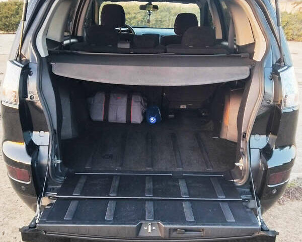 Черный Мицубиси Аутлендер, объемом двигателя 3 л и пробегом 225 тыс. км за 9200 $, фото 14 на Automoto.ua