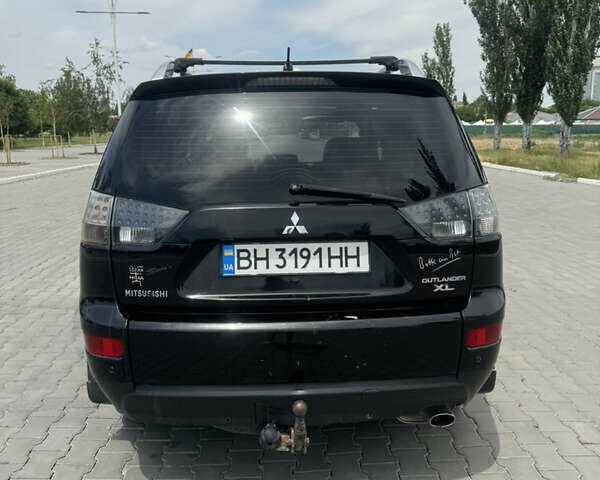 Міцубісі Аутлендер 2007 у Измаиле на Automoto.ua Чорний Міцубісі Аутлендер, об'ємом двигуна 2.36 л та пробігом 240 тис. км за 8500 $, фото 27 на Automoto.ua