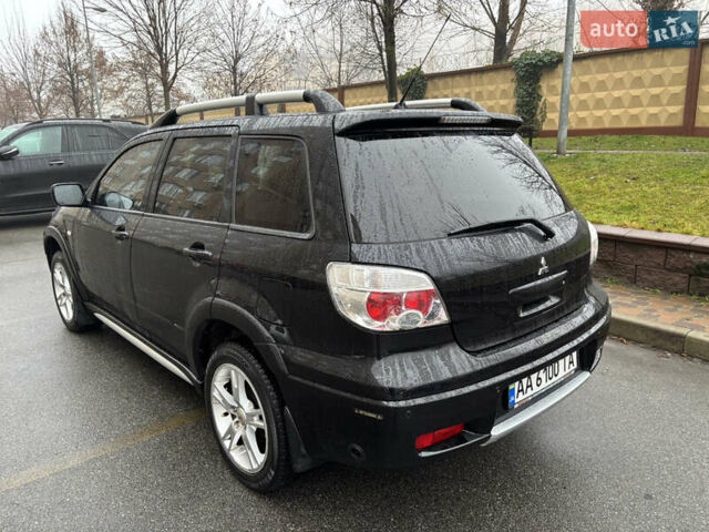 Чорний Міцубісі Аутлендер, об'ємом двигуна 2.4 л та пробігом 169 тис. км за 8000 $, фото 15 на Automoto.ua