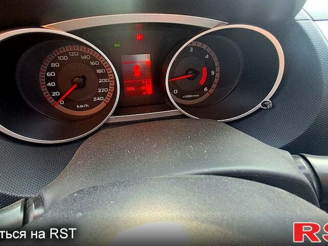 Черный Мицубиси Аутлендер, объемом двигателя 2 л и пробегом 285 тыс. км за 10000 $, фото 5 на Automoto.ua