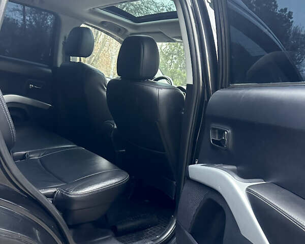 Чорний Міцубісі Аутлендер, об'ємом двигуна 2.4 л та пробігом 230 тис. км за 8300 $, фото 25 на Automoto.ua