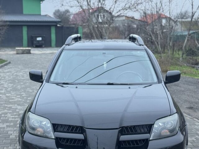 Чорний Міцубісі Аутлендер, об'ємом двигуна 2.4 л та пробігом 202 тис. км за 5800 $, фото 2 на Automoto.ua