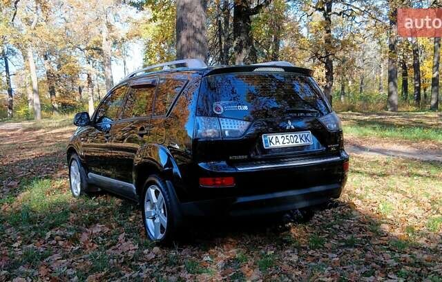 Міцубісі Аутлендер 2007 у Белой Церкве на Automoto.ua Чорний Міцубісі Аутлендер, об'ємом двигуна 3 л та пробігом 230 тис. км за 8800 $, фото 1 на Automoto.ua