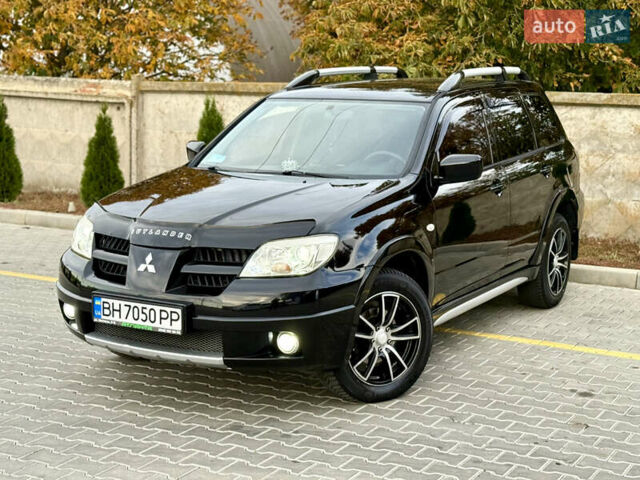 Міцубісі Аутлендер 2007 у Одесі на Automoto.ua Чорний Міцубісі Аутлендер, об'ємом двигуна 2.4 л та пробігом 201 тис. км за 7700 $, фото 32 на Automoto.ua