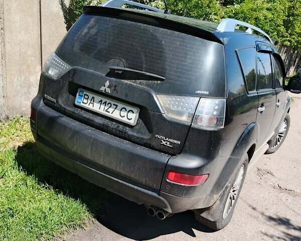 Черный Мицубиси Аутлендер, объемом двигателя 3 л и пробегом 250 тыс. км за 8700 $, фото 8 на Automoto.ua