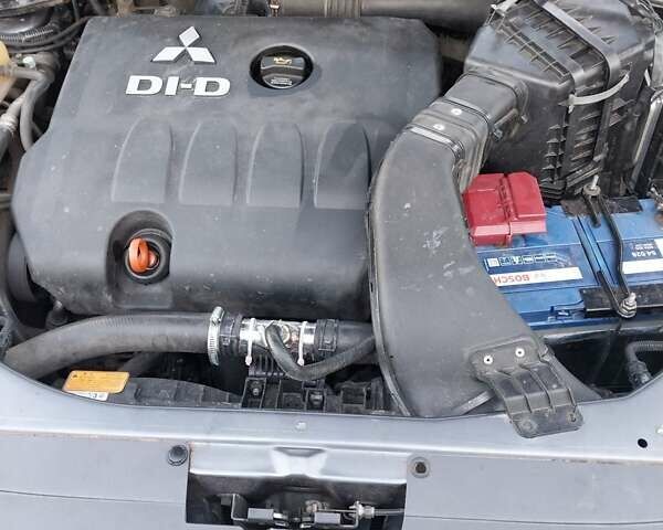 Чорний Міцубісі Аутлендер, об'ємом двигуна 1.97 л та пробігом 350 тис. км за 7888 $, фото 18 на Automoto.ua