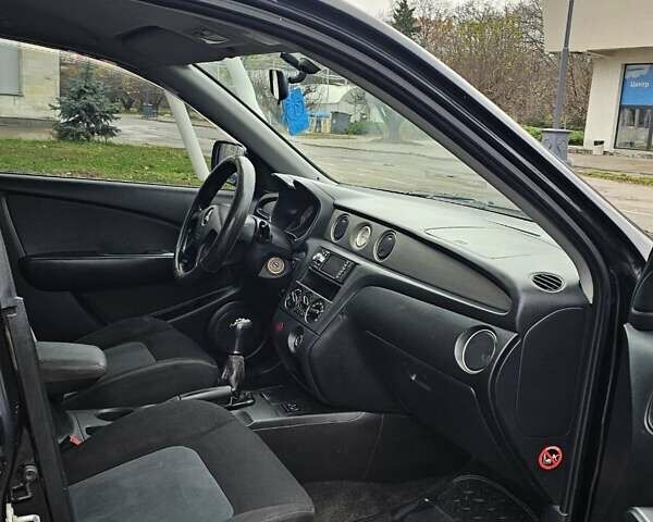 Чорний Міцубісі Аутлендер, об'ємом двигуна 2 л та пробігом 200 тис. км за 4700 $, фото 21 на Automoto.ua