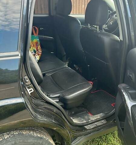 Черный Мицубиси Аутлендер, объемом двигателя 3 л и пробегом 257 тыс. км за 9200 $, фото 3 на Automoto.ua