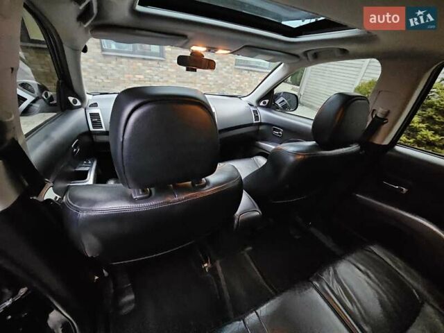 Черный Мицубиси Аутлендер, объемом двигателя 3 л и пробегом 238 тыс. км за 10800 $, фото 32 на Automoto.ua