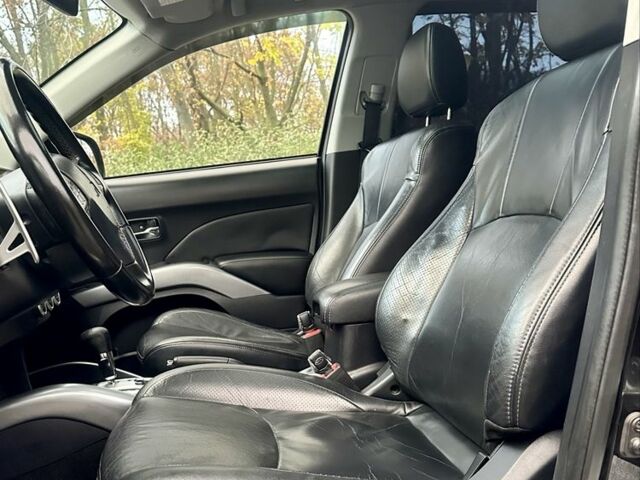 Черный Мицубиси Аутлендер, объемом двигателя 2.4 л и пробегом 230 тыс. км за 8500 $, фото 13 на Automoto.ua