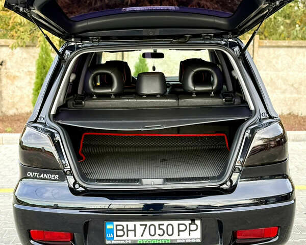 Міцубісі Аутлендер 2007 у Одесі на Automoto.ua Чорний Міцубісі Аутлендер, об'ємом двигуна 2.4 л та пробігом 201 тис. км за 7700 $, фото 13 на Automoto.ua