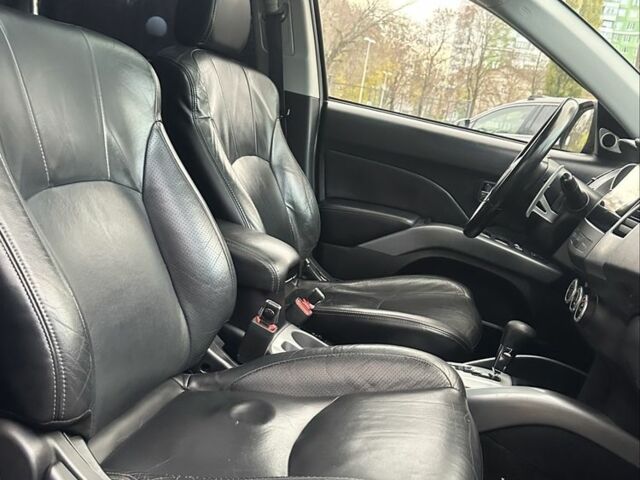 Черный Мицубиси Аутлендер, объемом двигателя 2.4 л и пробегом 230 тыс. км за 8500 $, фото 16 на Automoto.ua