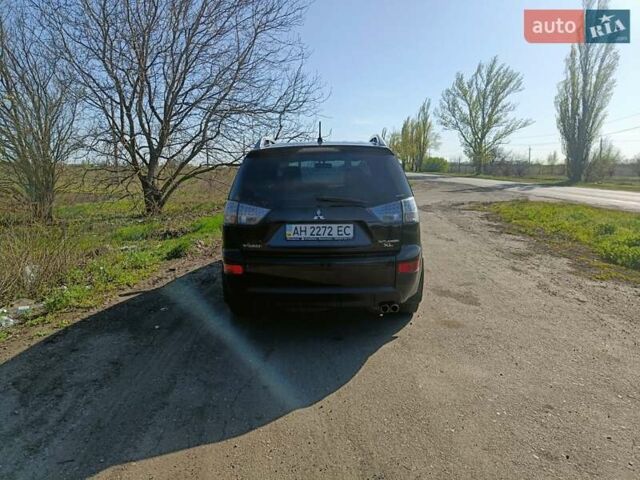 Черный Мицубиси Аутлендер, объемом двигателя 3 л и пробегом 230 тыс. км за 9500 $, фото 5 на Automoto.ua