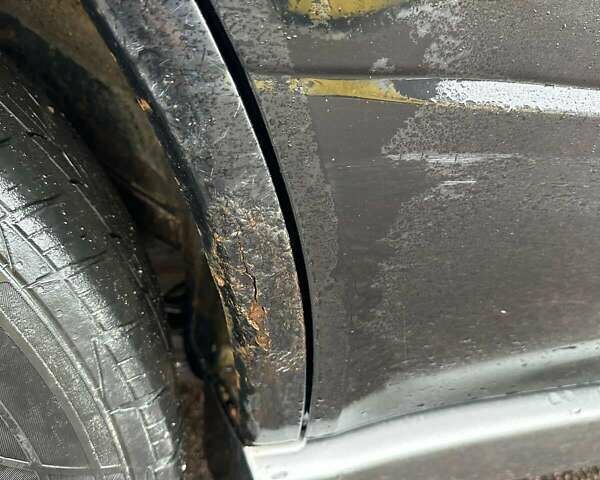 Черный Мицубиси Аутлендер, объемом двигателя 2 л и пробегом 295 тыс. км за 5300 $, фото 17 на Automoto.ua