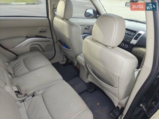 Черный Мицубиси Аутлендер, объемом двигателя 3 л и пробегом 155 тыс. км за 9800 $, фото 19 на Automoto.ua