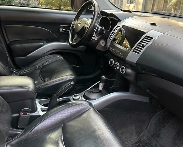 Чорний Міцубісі Аутлендер, об'ємом двигуна 3 л та пробігом 238 тис. км за 11200 $, фото 22 на Automoto.ua