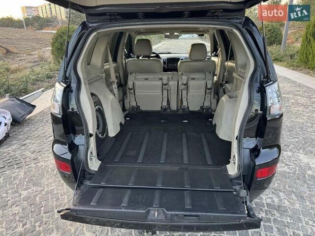 Черный Мицубиси Аутлендер, объемом двигателя 3 л и пробегом 205 тыс. км за 11300 $, фото 27 на Automoto.ua