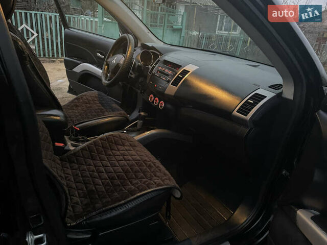 Чорний Міцубісі Аутлендер, об'ємом двигуна 3 л та пробігом 265 тис. км за 9200 $, фото 21 на Automoto.ua